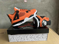 Air Jordan Sneakers - Orange, Black & White