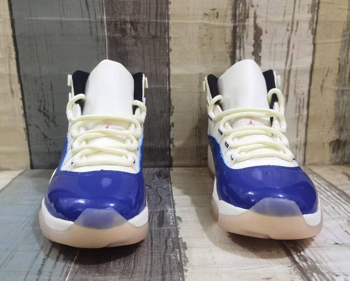 Air Jordan 11 Retro Sail & Deep Royal Blue High-Top Sneakers