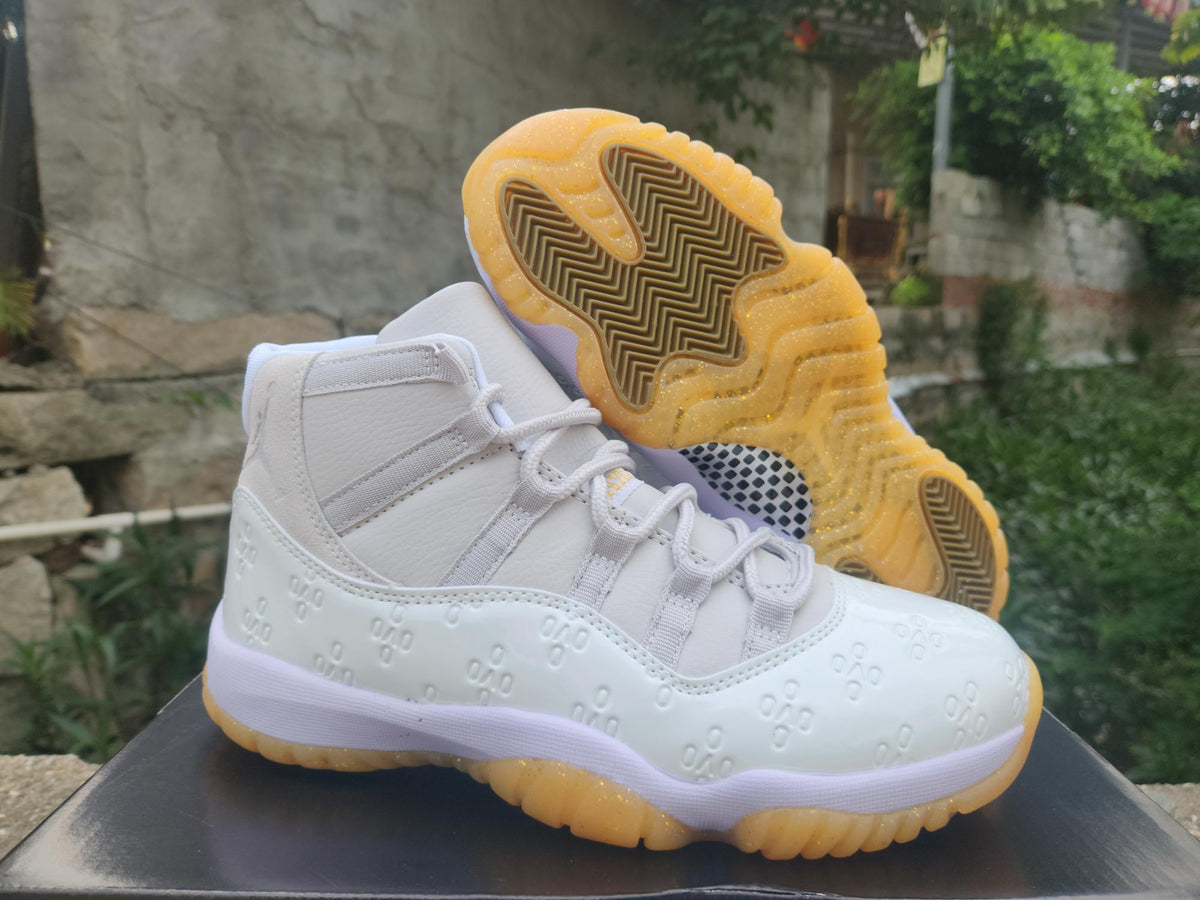 Air Jordan 11 Retro White & Light Yellow High-Top Sneakers
