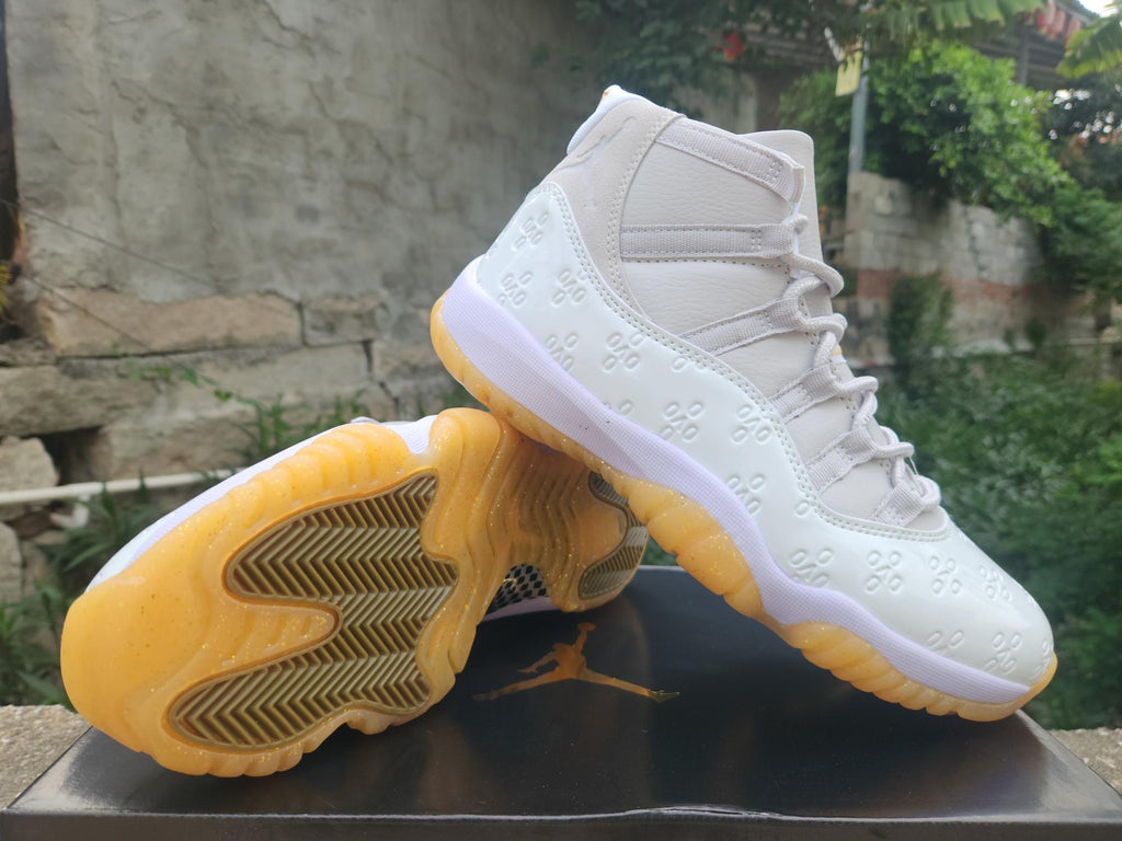 Air Jordan 11 Retro White & Light Yellow High-Top Sneakers