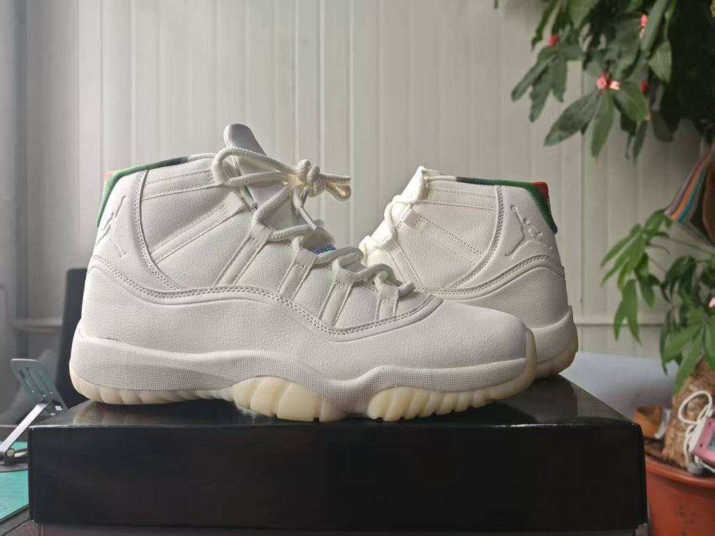 Air Jordan 11 Retro Sail Off-White High-Top Sneakers