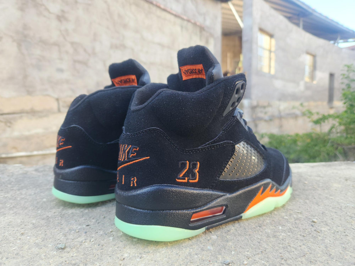 Air Jordan High-Top Sneakers - Black & Orange with Mint Green Sole