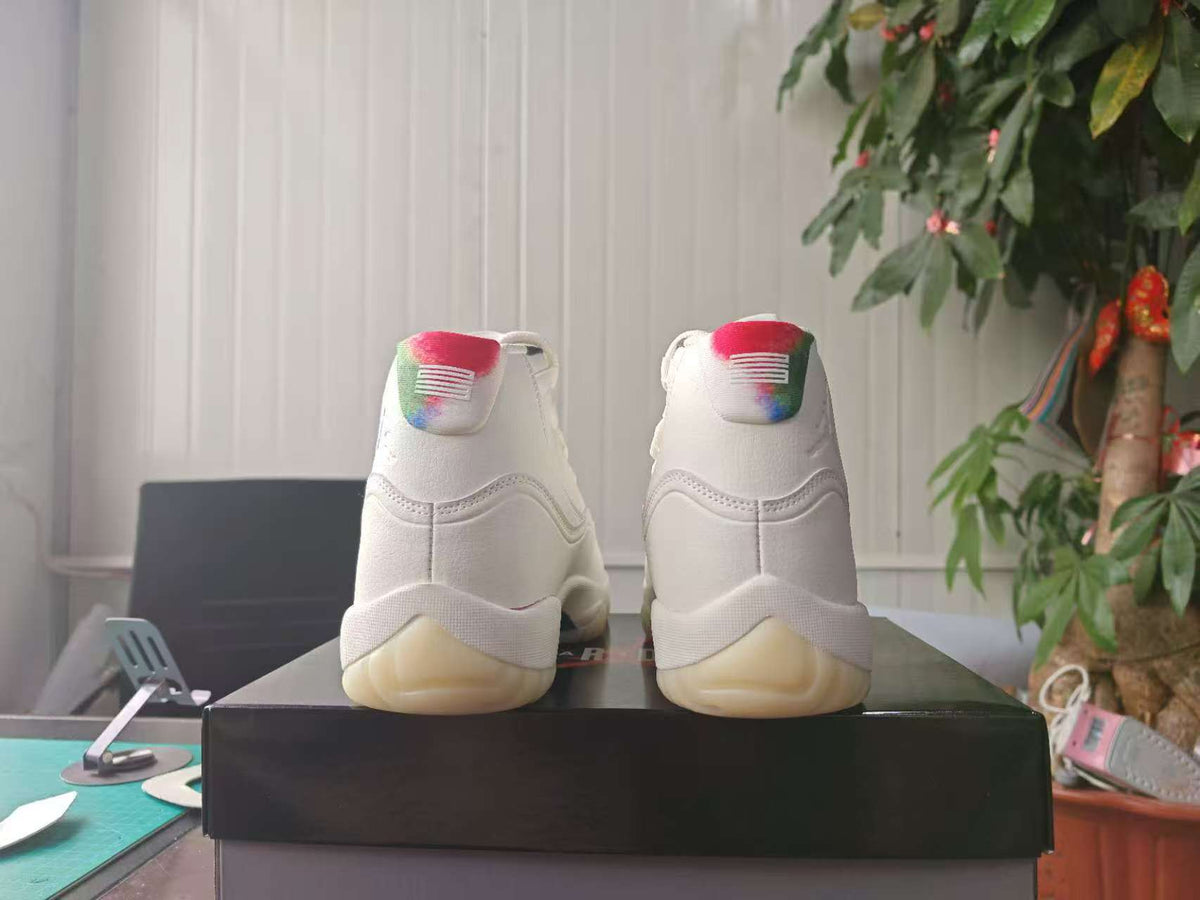 Air Jordan 11 Retro Sail Off-White High-Top Sneakers