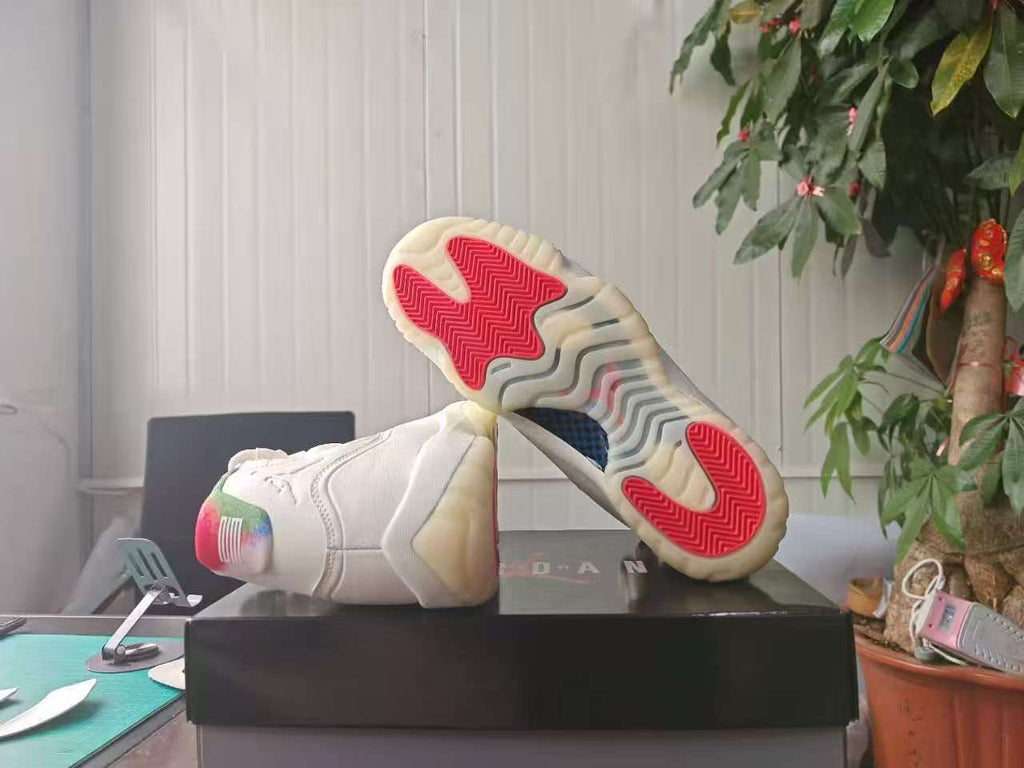 Air Jordan 11 Retro Sail Off-White High-Top Sneakers