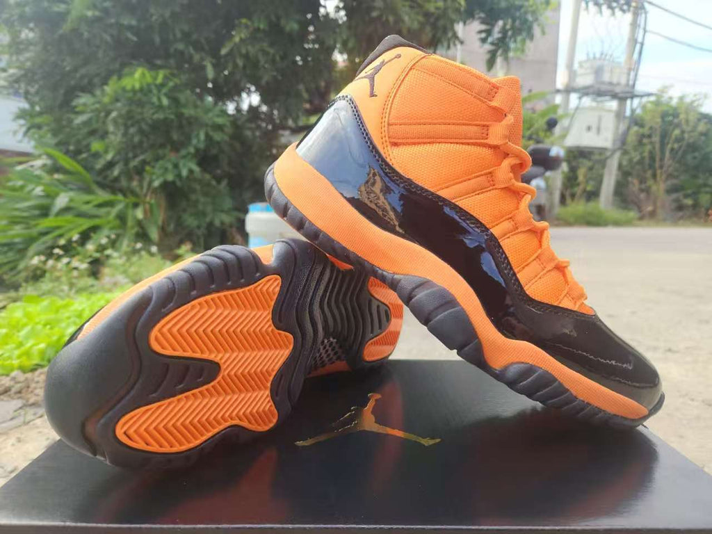 Air Jordan 11 Retro Orange & Black High-Top Sneakers